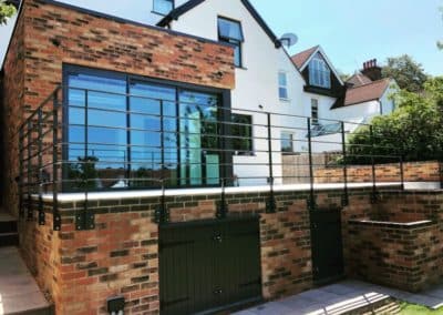 metal railings on decking back garden